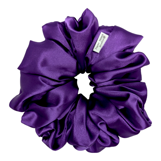 large vibrant purple satin scrunchie handmade by paper dazed